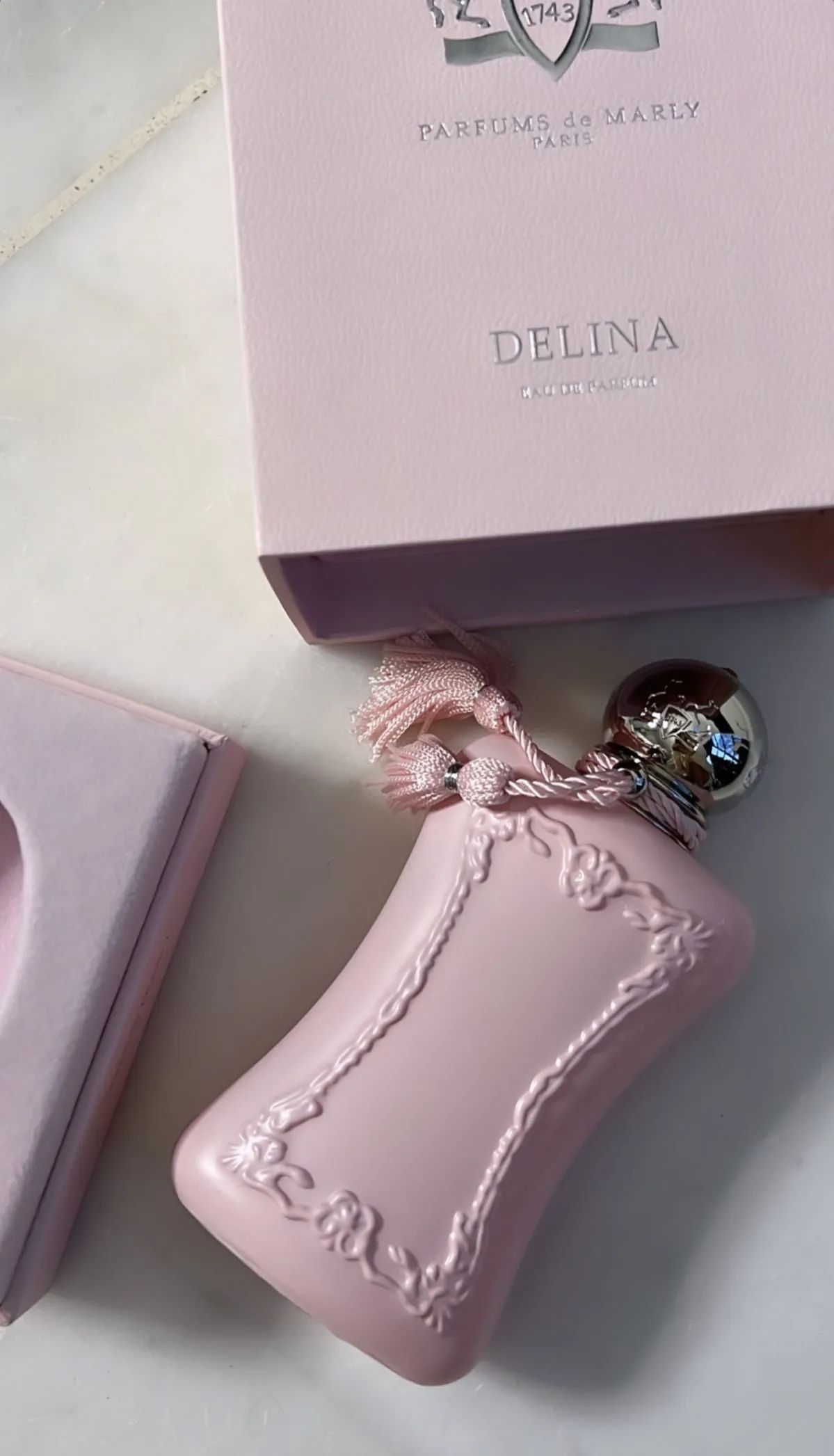 De Marly Delina